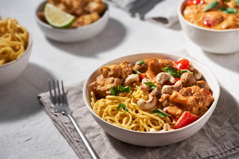 Panang curry with tofu, peppers, mushrooms and Thai . Served with egg noodles.basil