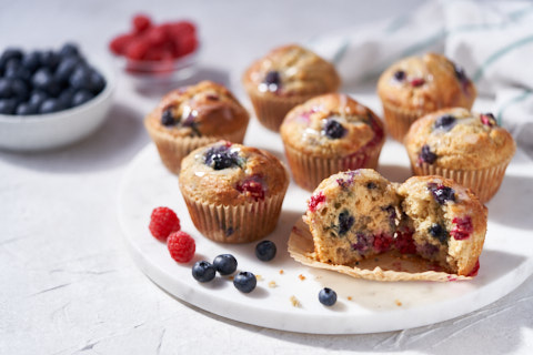Wholemeal blueberry and raspberry muffins made with yoghurt and olive oil