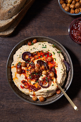 Hummus with roasted garlic, onion, smoked harissa and crispy chickpeas