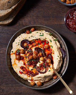 Hummus with roasted garlic, onion, smoked harissa and crispy chickpeas