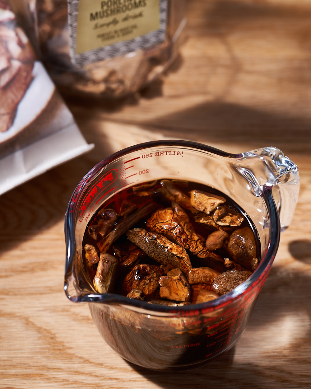 Dried porcini mushrooms soaking in hot water